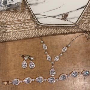 Necklace , earrings, and bracelet